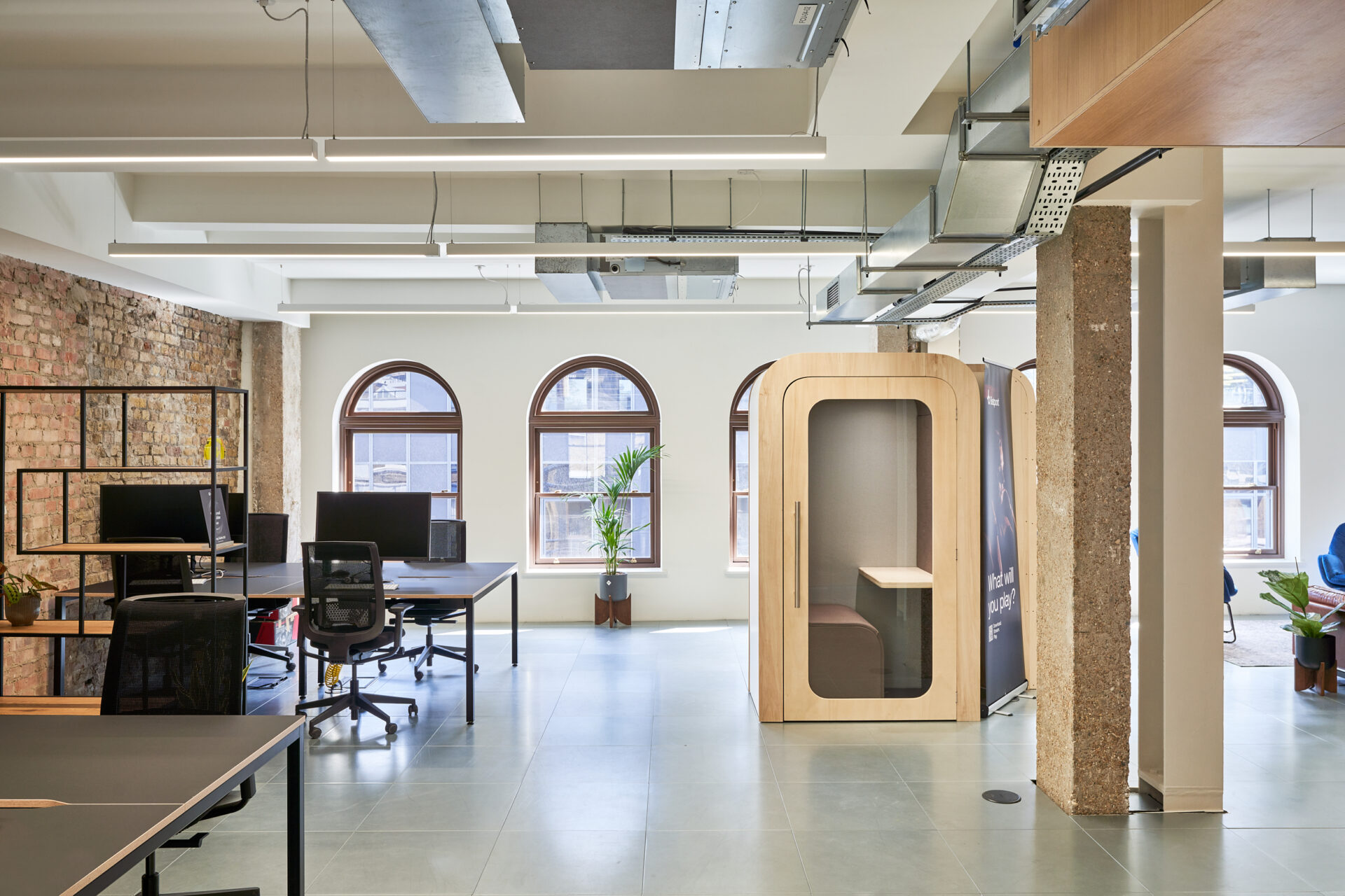 Beatport open office workspace with phone booth